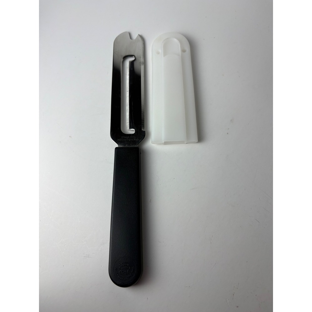 The Pampered Chef Stainless Steel Serrated Cheese Plane Slicer with Safety Cover